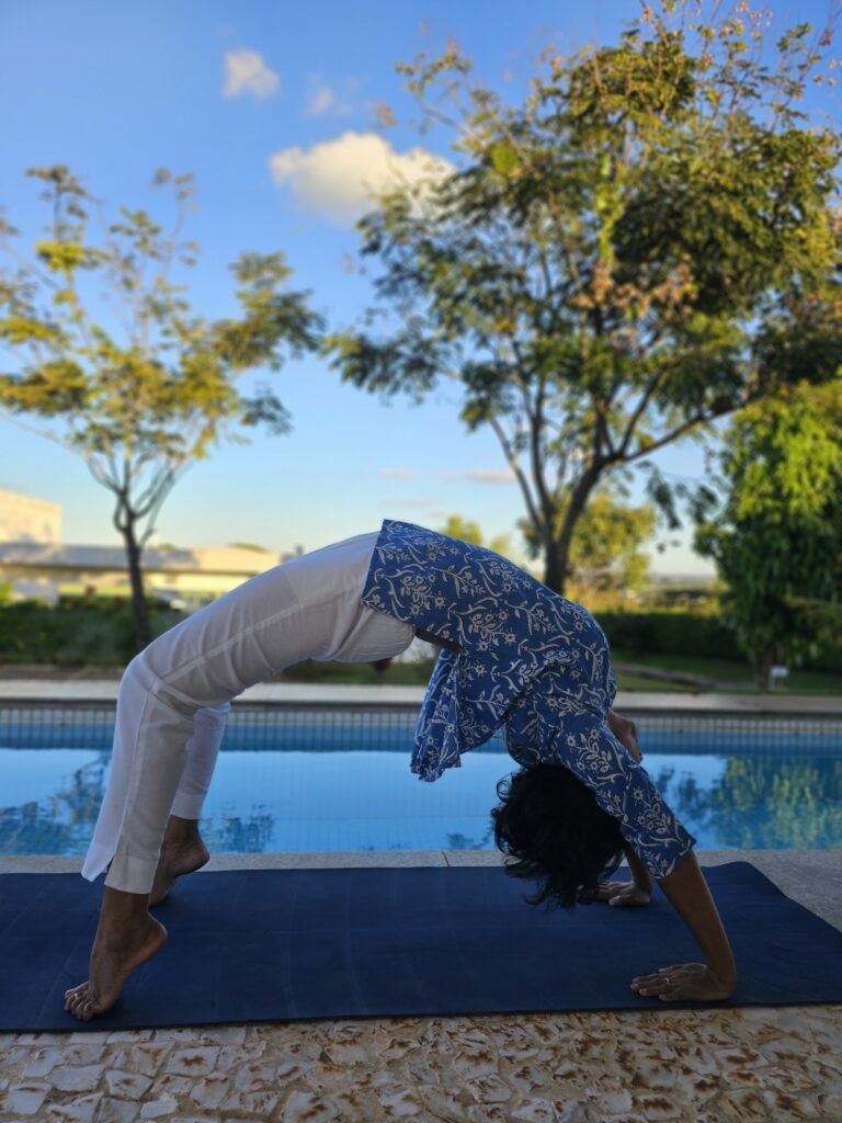 Yoga instructor doing Bridge Pose